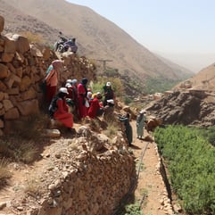 People on the side of a mountain
