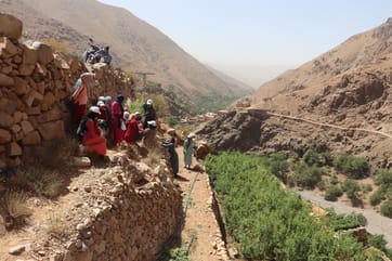 People on the side of a mountain
