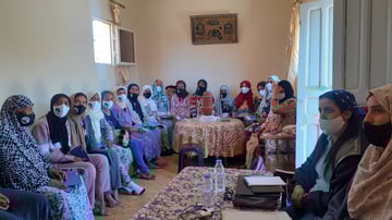 women sitting in a workshop classroom