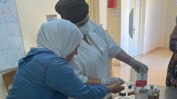 Tislit nortane teaching soapmaking