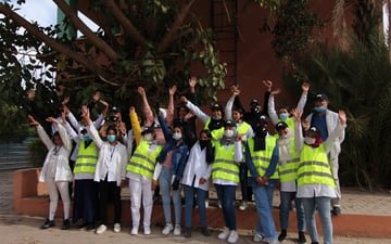 Volunteers wearing high visibility vests
