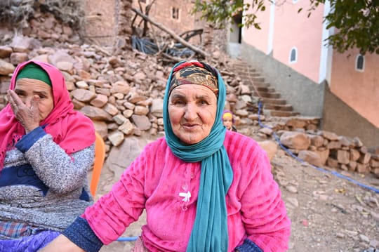 Woman wearing pink looking at camera
