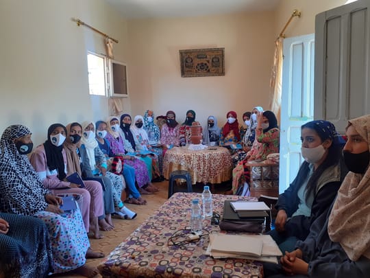 women sitting in a workshop classroom