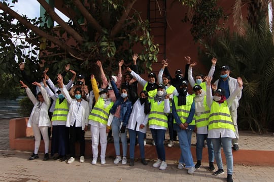 Volunteers wearing high visibility vests